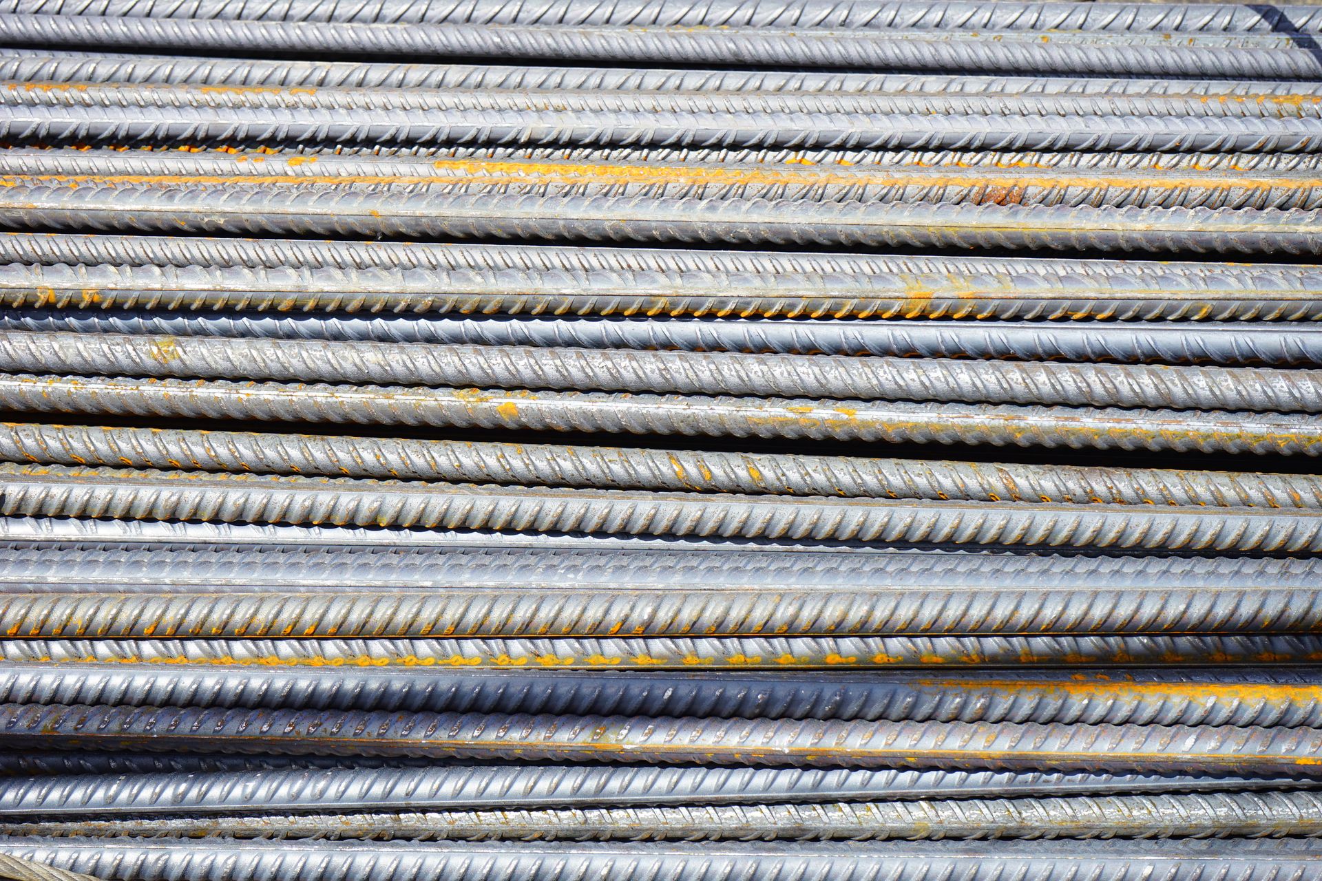 Stacked steel reinforcement bars ready for supply